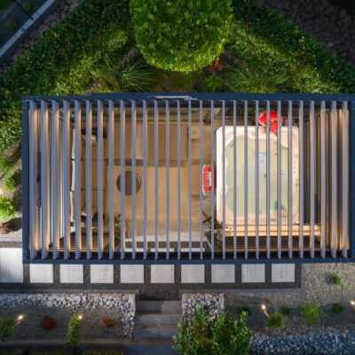A top view of a pergola with a hot tub and seating area, featuring movable boards for pergolas to control sunlight.